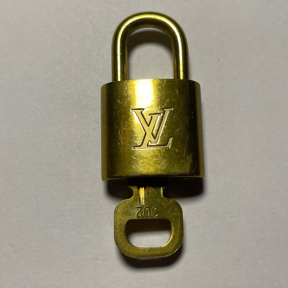 Louis Vuitton #302 lock and key